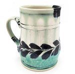 White & Teal Mug With Leaves