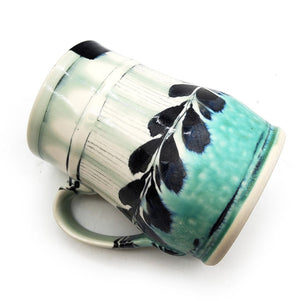 White & Teal Mug With Leaves