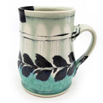 White & Teal Mug With Leaves