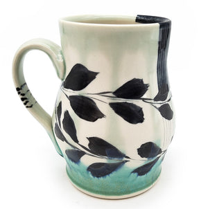 White & Teal Mug With Flower