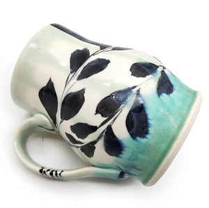 White & Teal Mug With Flower