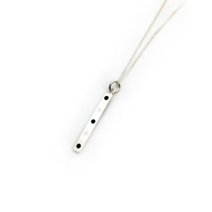 Silver Bar With Black and White Dots