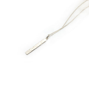Silver Bar With Black and White Dots