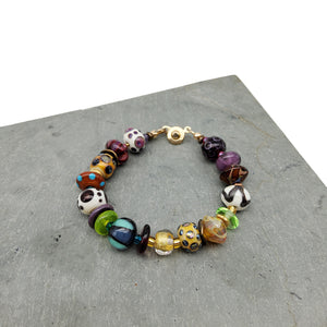 Purple and Green Glass Bead Bracelet
