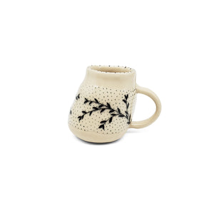 
            
                Load image into Gallery viewer, Black Vines and Teal Dots Slouchy Mug
            
        